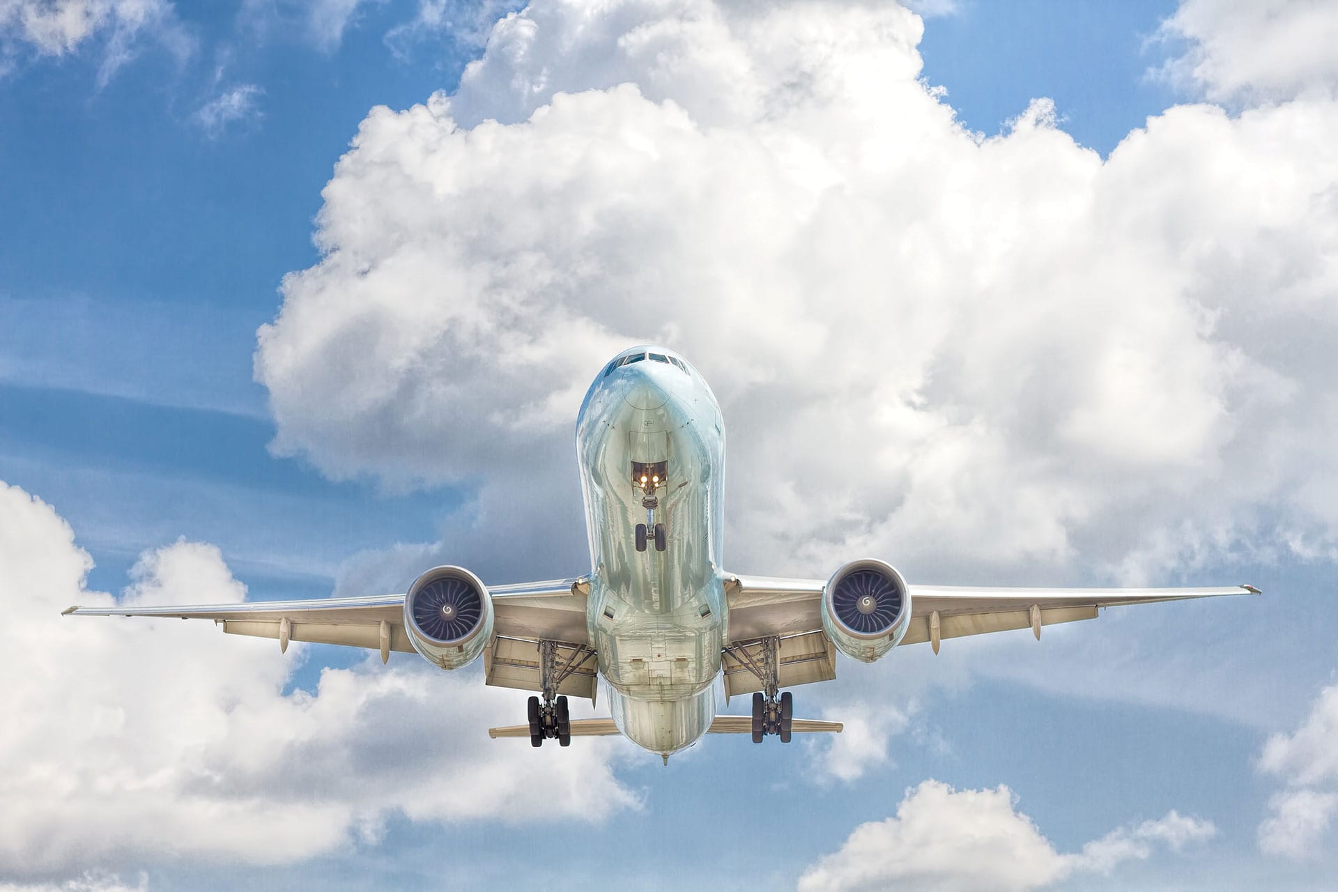 john-mcarthur-PrdNTrIrG8w-unsplash A photo of a jet passenger plane in flight