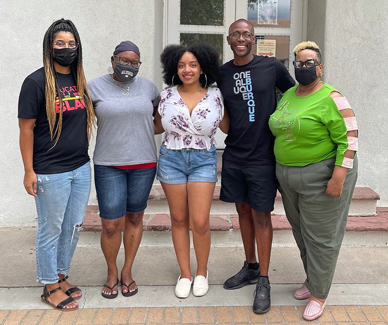 UNM Black Alumni chapter members posing for camera outside