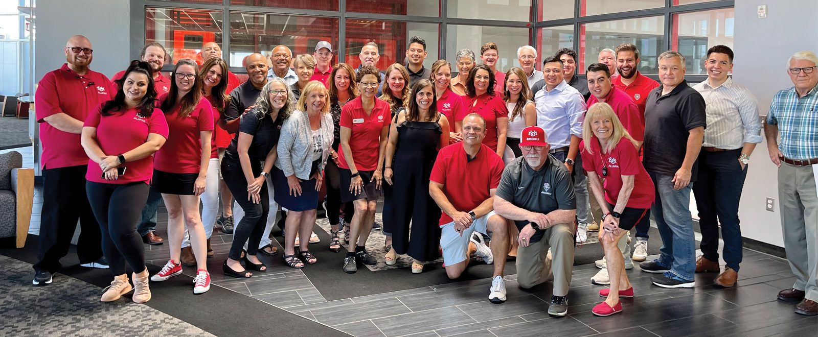 UNM Alumni Board of Directors with Head Football Coach Danny Gonzales (’98 BBA, ’02 MS) and retired UNM Baseball Coach Ray Birmingham