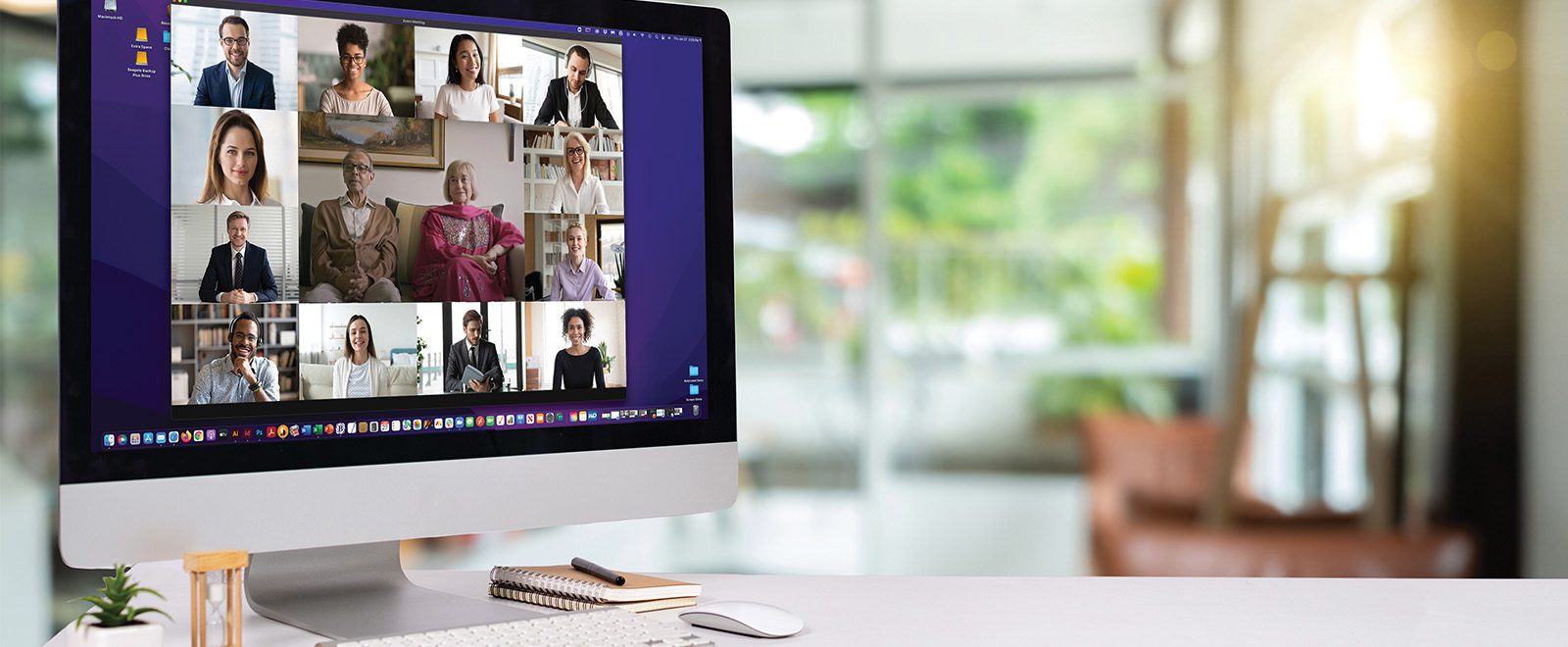 a computer with a zoom meeting going with mulitple participants